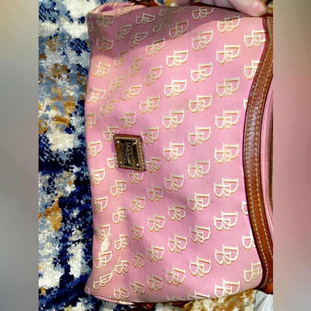 Stained pretty bag on the main pocket